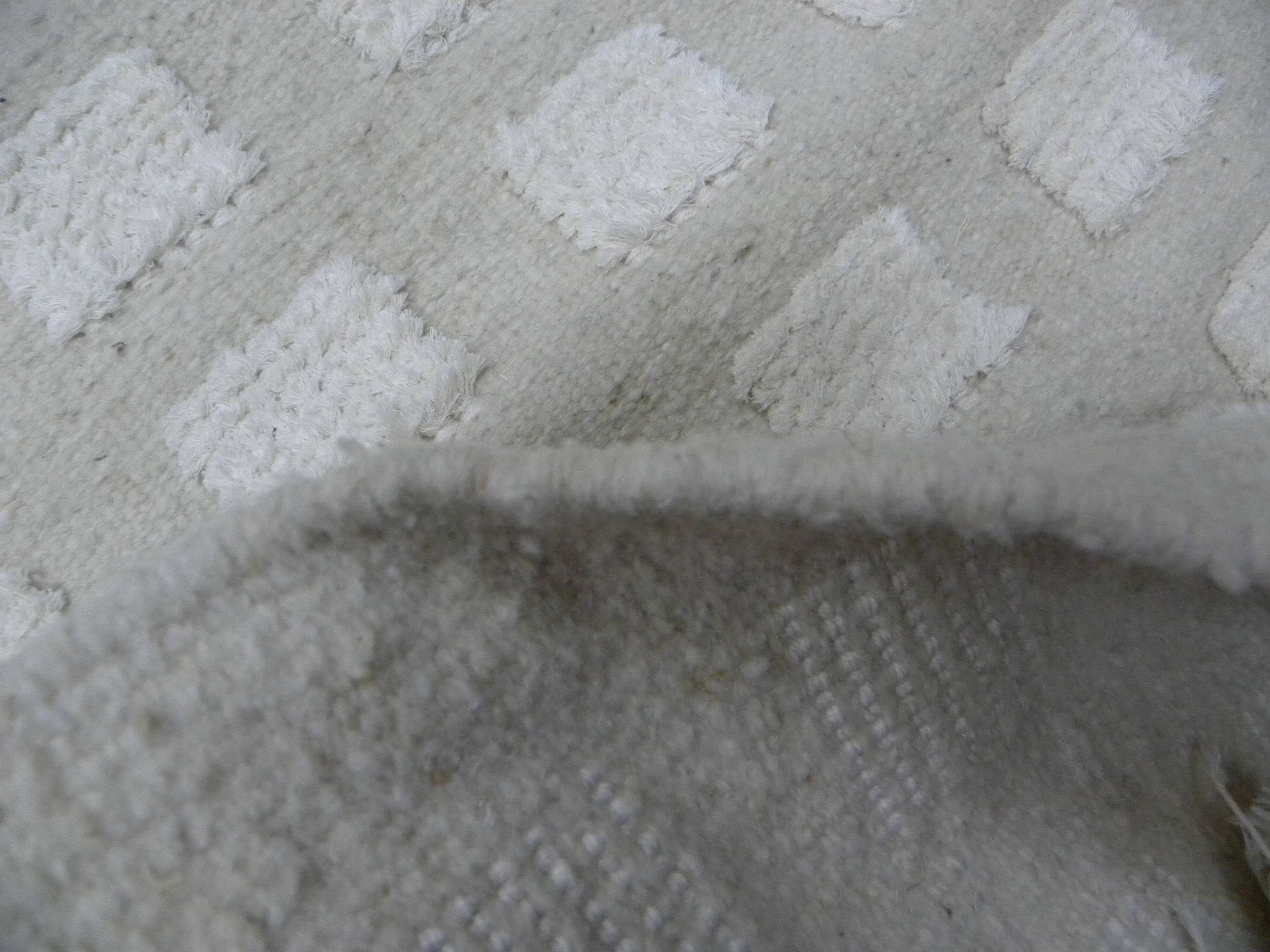 Tunisian Berber rug handwoven from pure sheep wool.