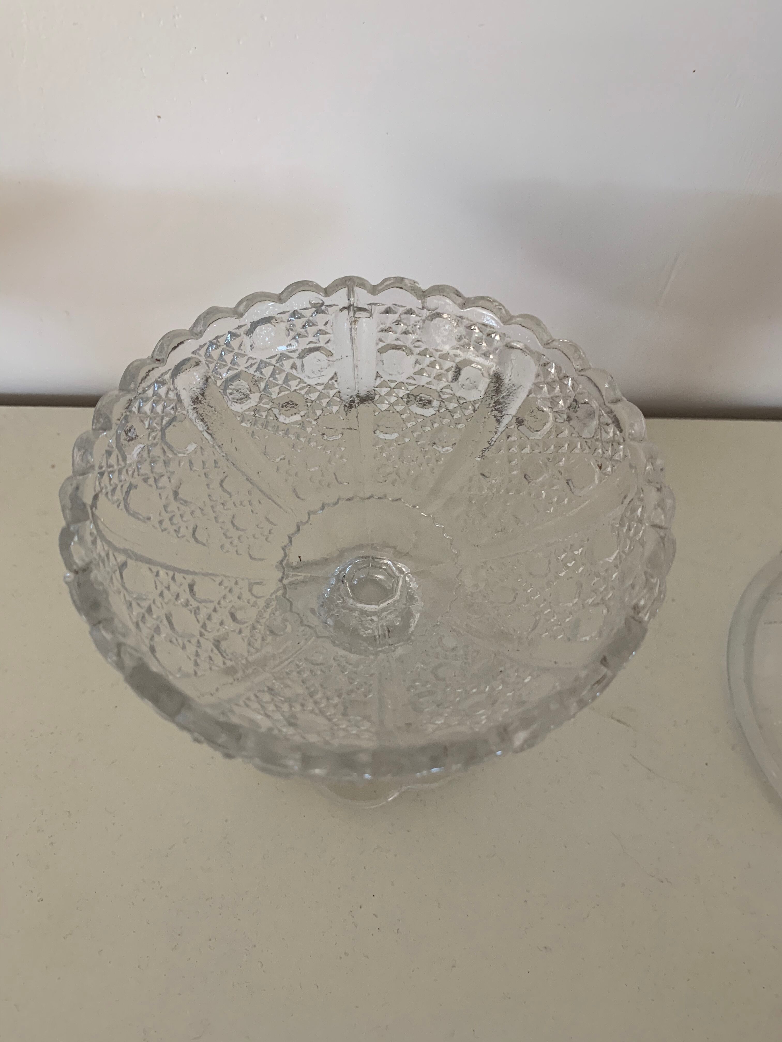 Two dredged cups in transparent glass geometric patterns in old relief