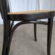 Chaise de salle à manger vintage style Thonet en bois noir et assise en cannage 1970