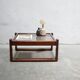 Table basse vintage en teck et verre