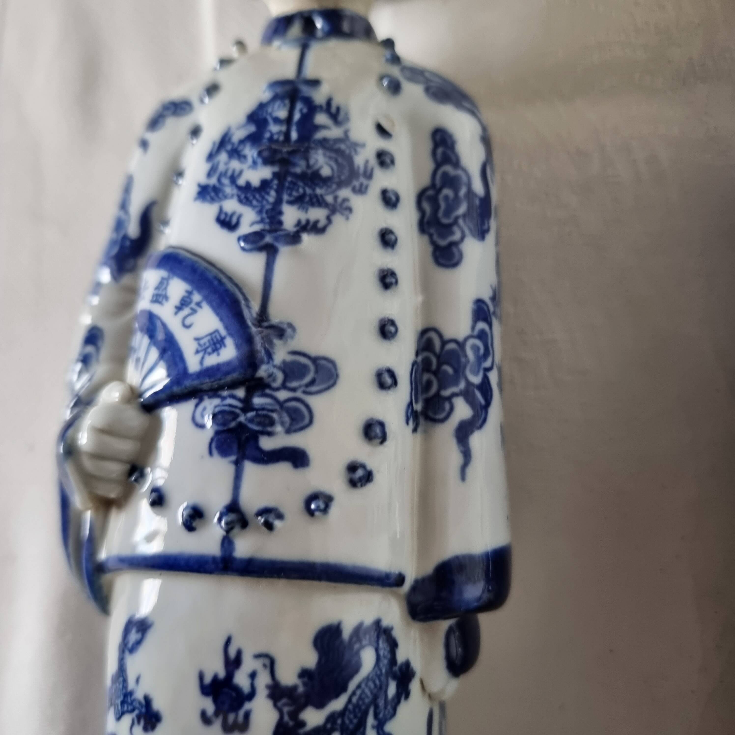 Pair of vintage Chinese blue and white porcelain figurines depicting