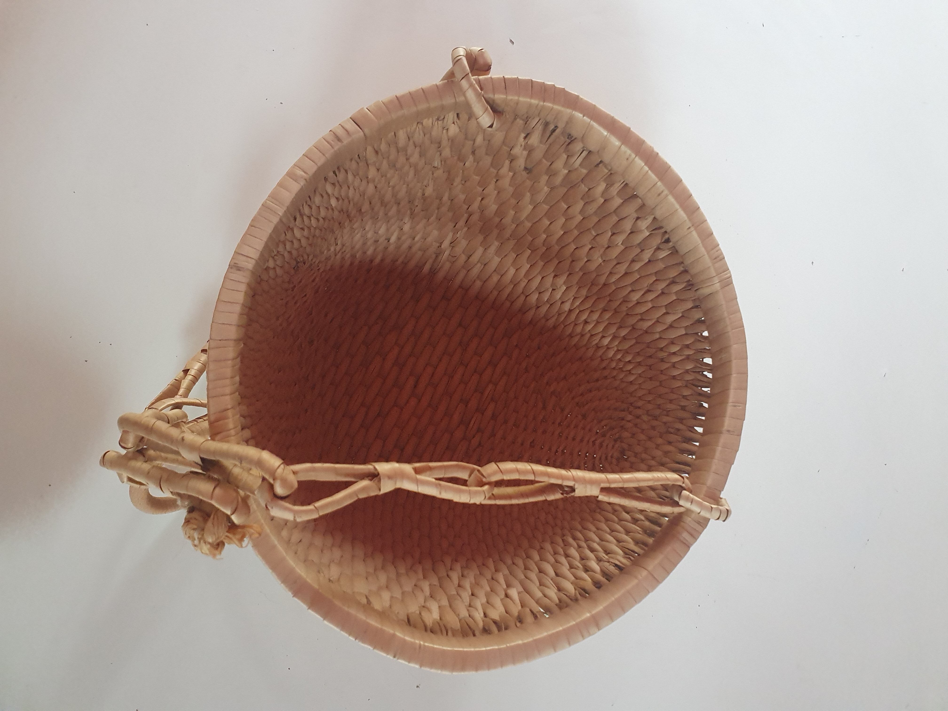 Rattan basket to hang vintage plant door