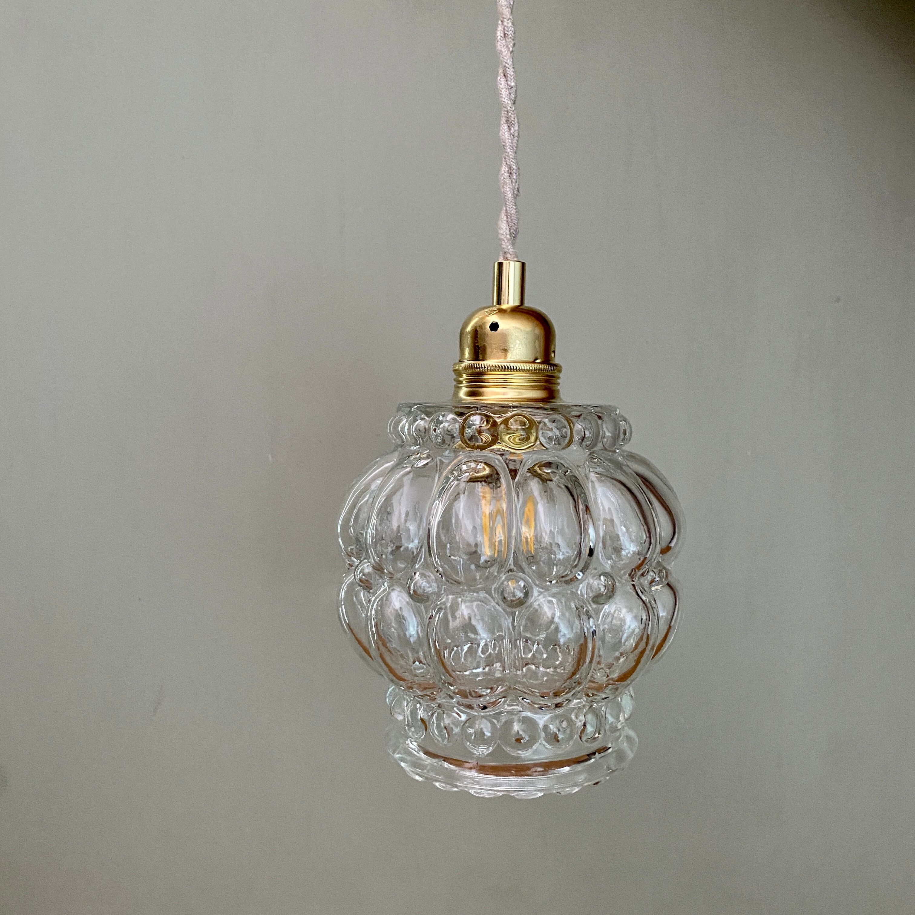 Vintage globe pendant lamp in transparent molded glass