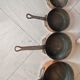 Lot de 7 casseroles en cuivre / manche en laiton