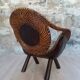 Wood and wicker "dog" armchair