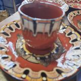 Set of etnic ceramic cups and plates