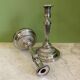 Pair of silvered bronze candlesticks from the 19th century in Louis XVI style signed Voisenet.