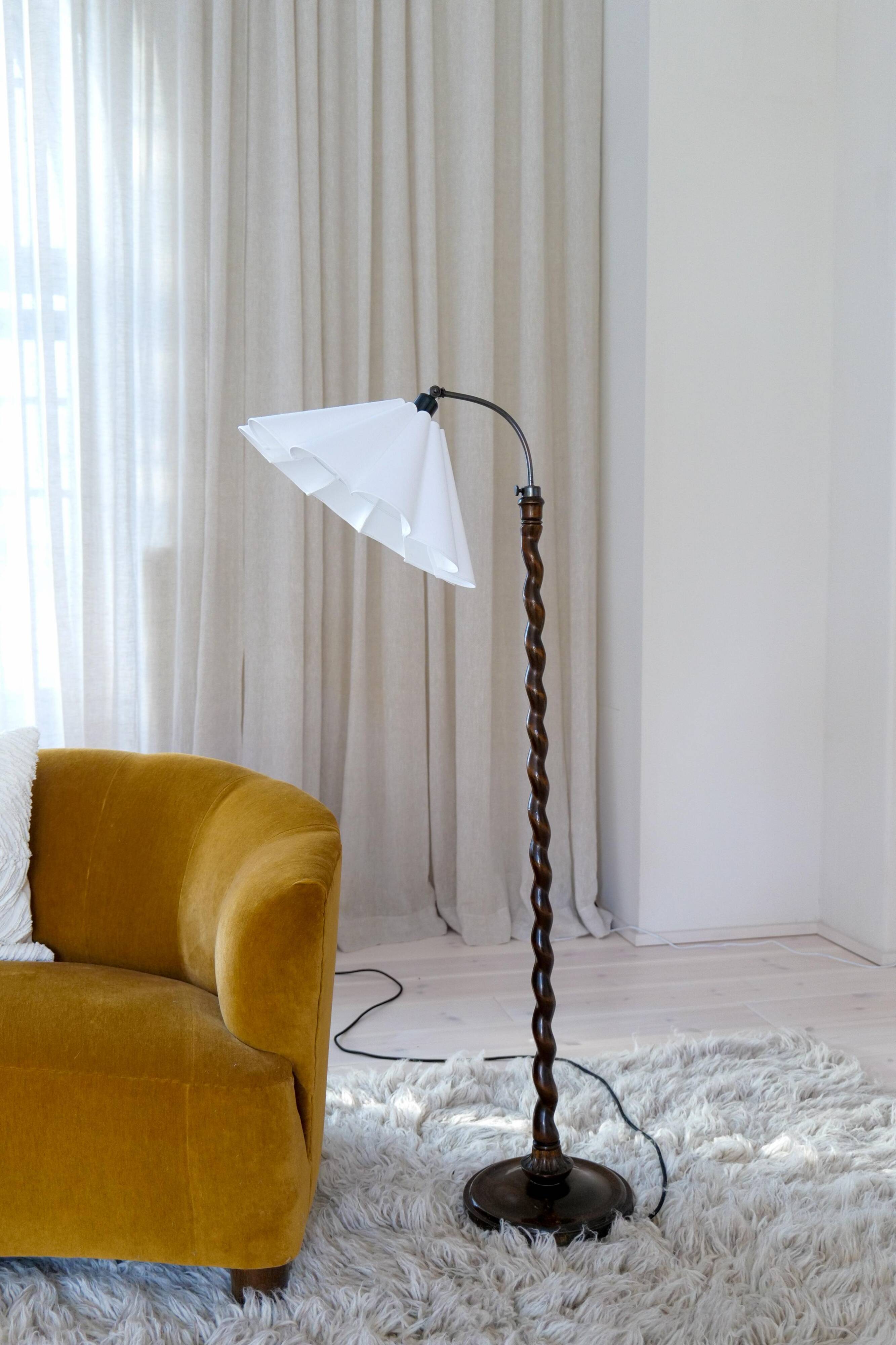 Organic whirlwind floor lamp in stained birch, Sweden, 1940s.