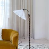 Organic whirlwind floor lamp in stained birch, Sweden, 1940s.