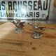 Set of two vintage silver-plated candle holders.