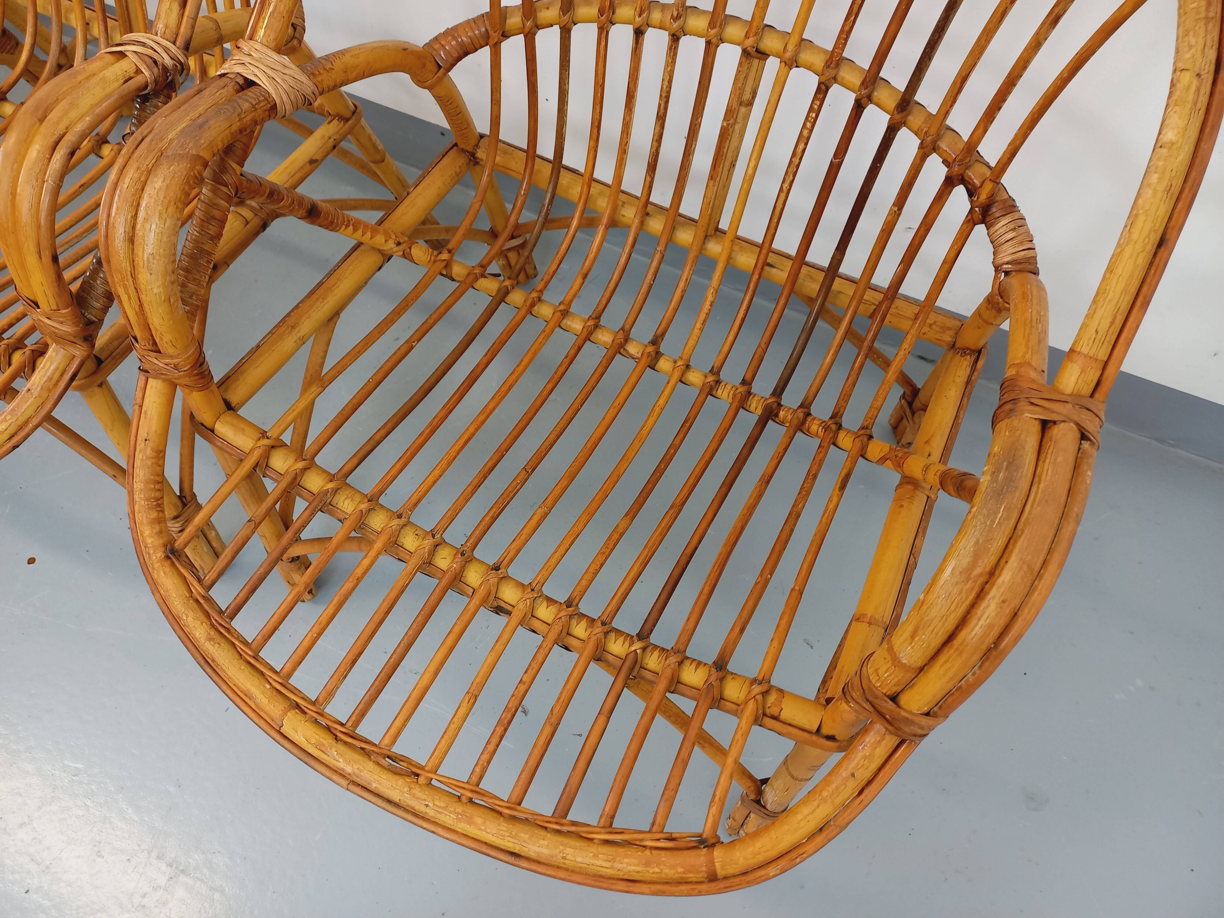 Set of 4 vintage rattan armchairs from the 60s