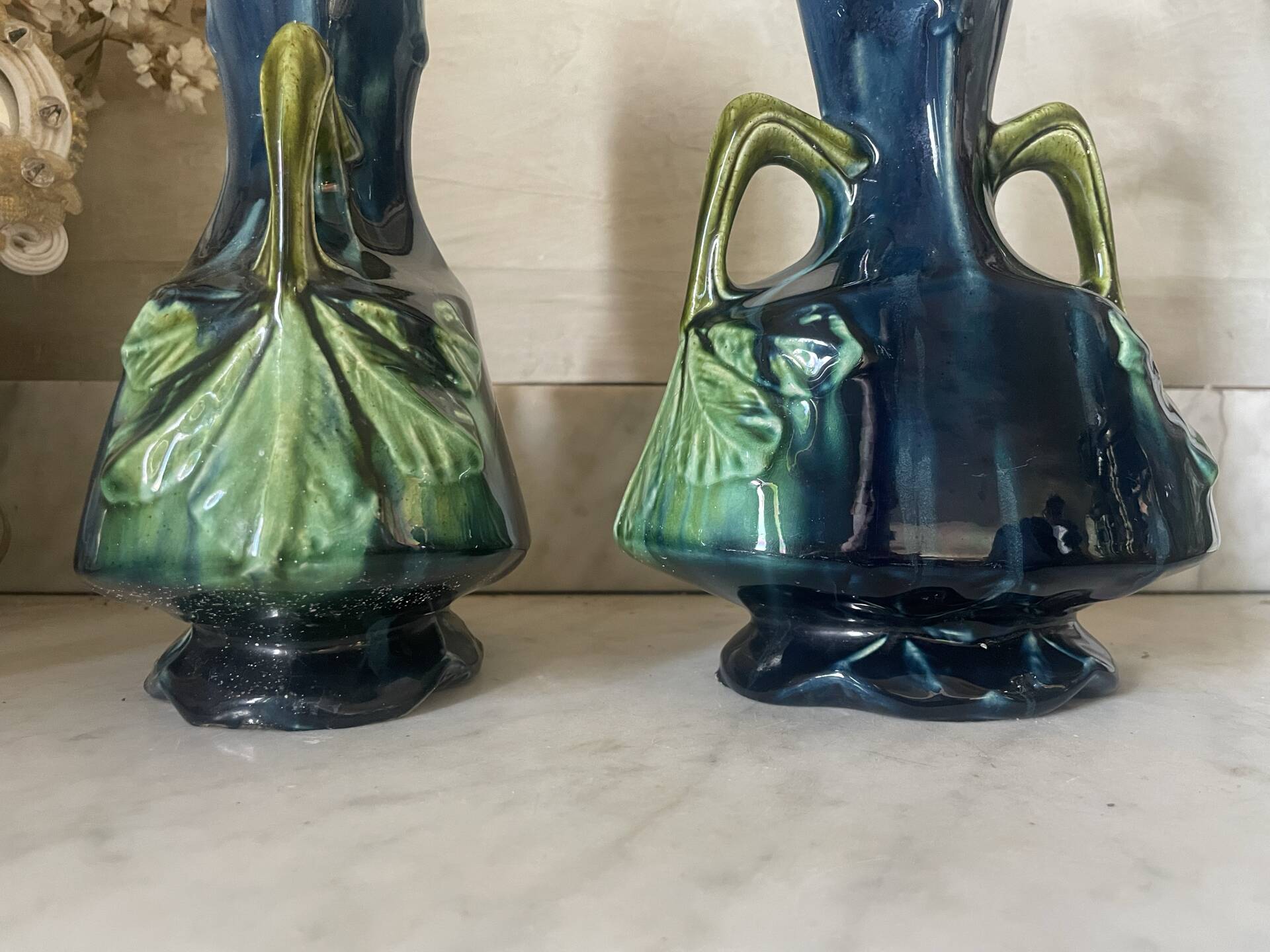 Pair of vases in slipware with Art Nouveau floral decoration.