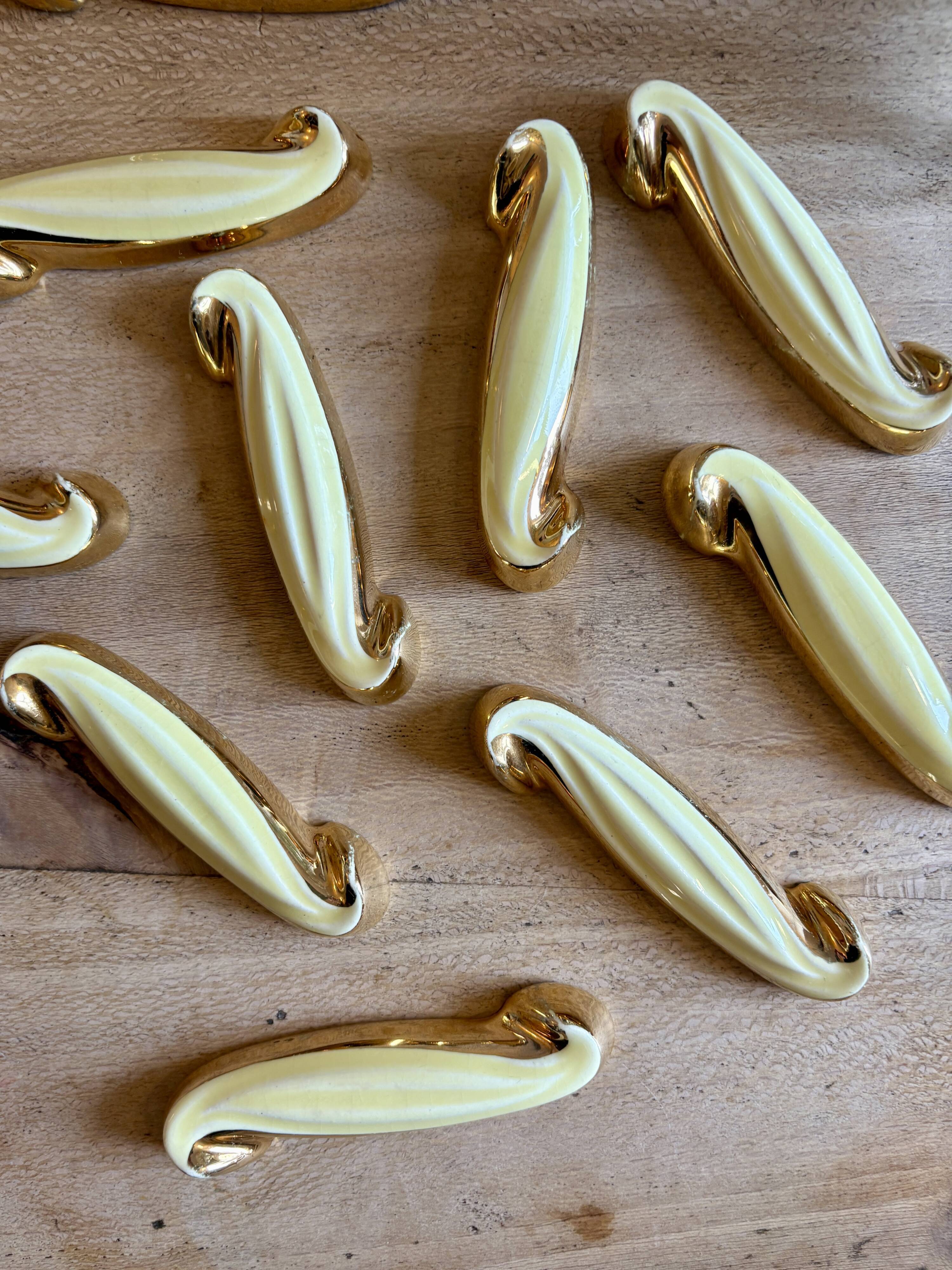 Set of 12 vintage art deco yellow and gold ceramic knife rests
