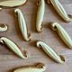 Set of 12 vintage art deco yellow and gold ceramic knife rests