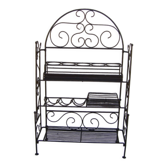 Old folding wrought iron shelf