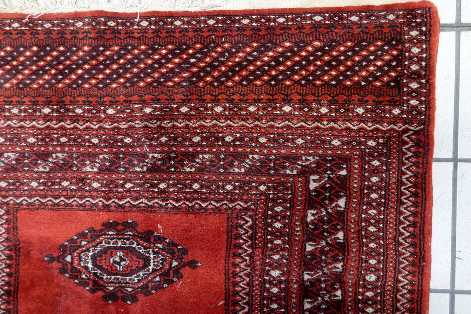 Handmade vintage Uzbek Bukhara rug 91cm x 155cm, 1950s