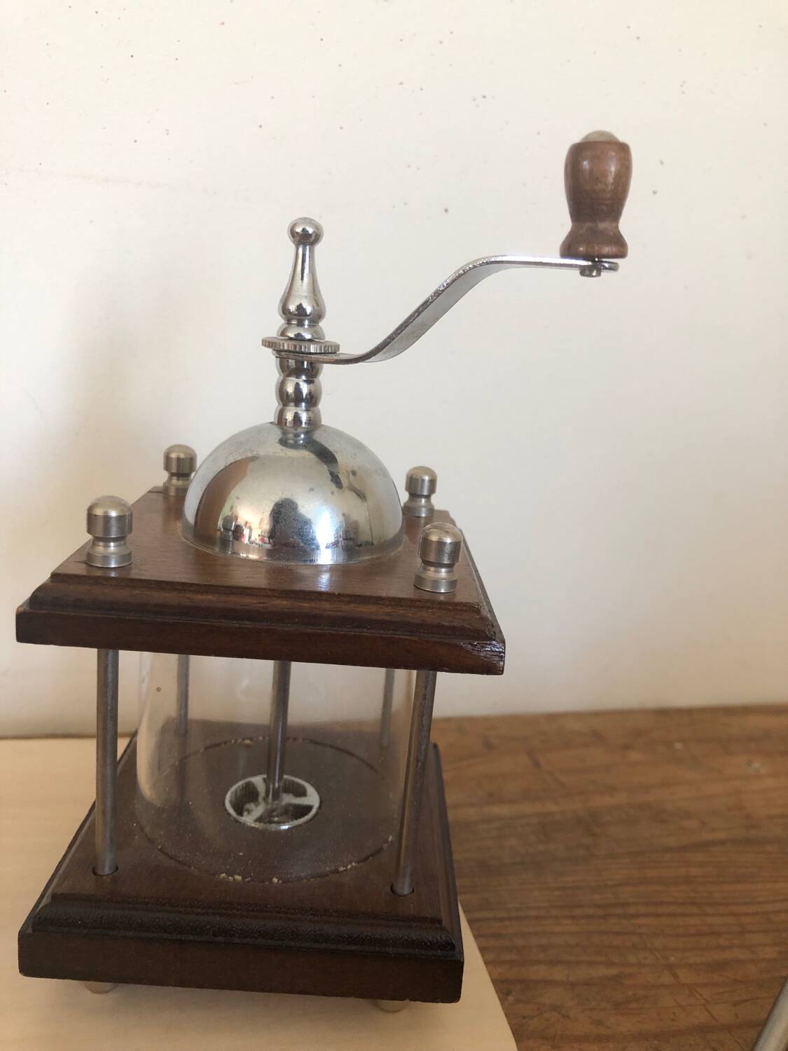 Small old manual pepper or spice mill