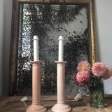 Pair of vintage salmon pink candlestick shaped ceramic lamp bases
