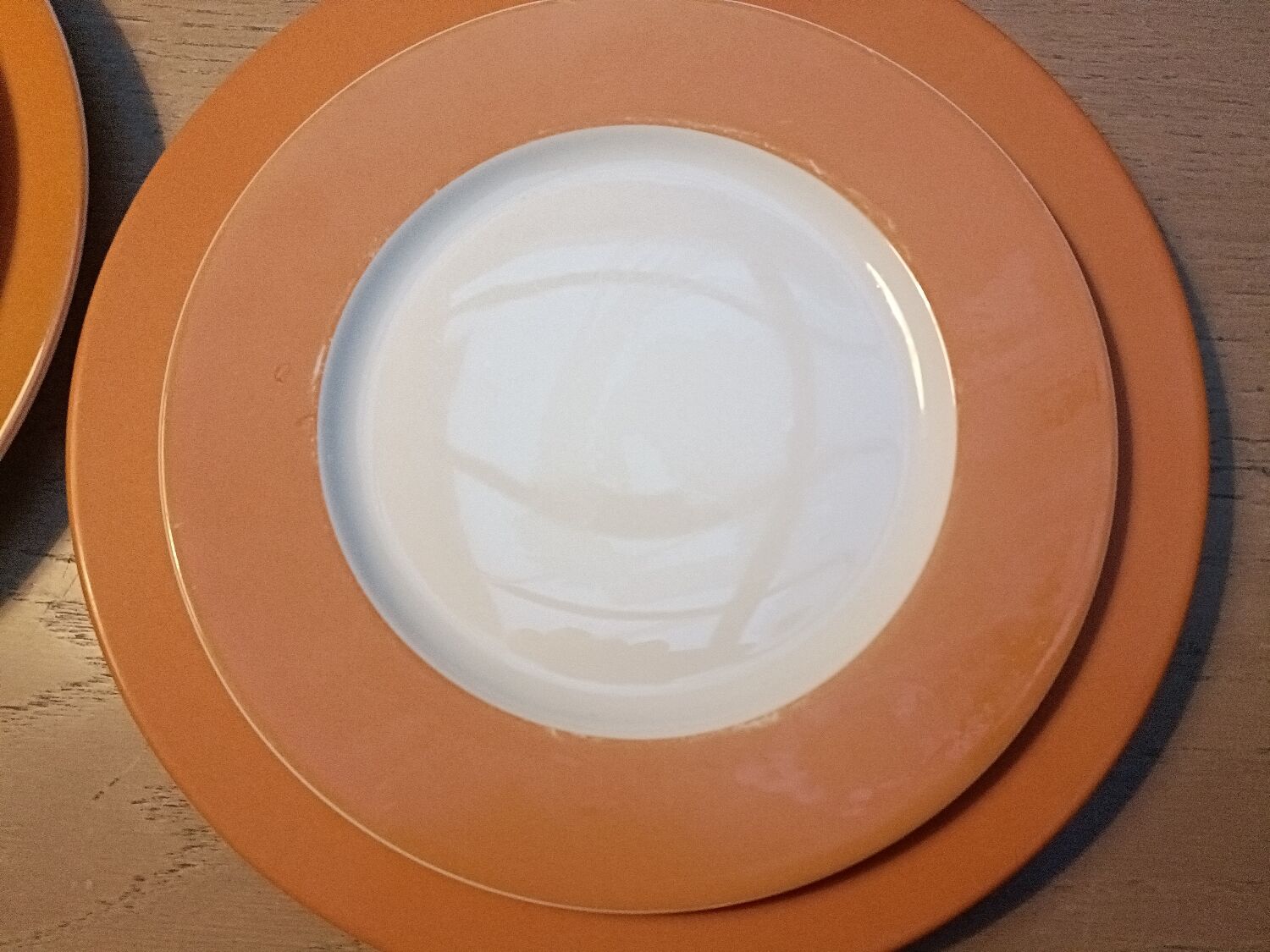 Orange Limoges porcelain plates