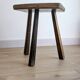Antique tripod stool in patinated solid wood