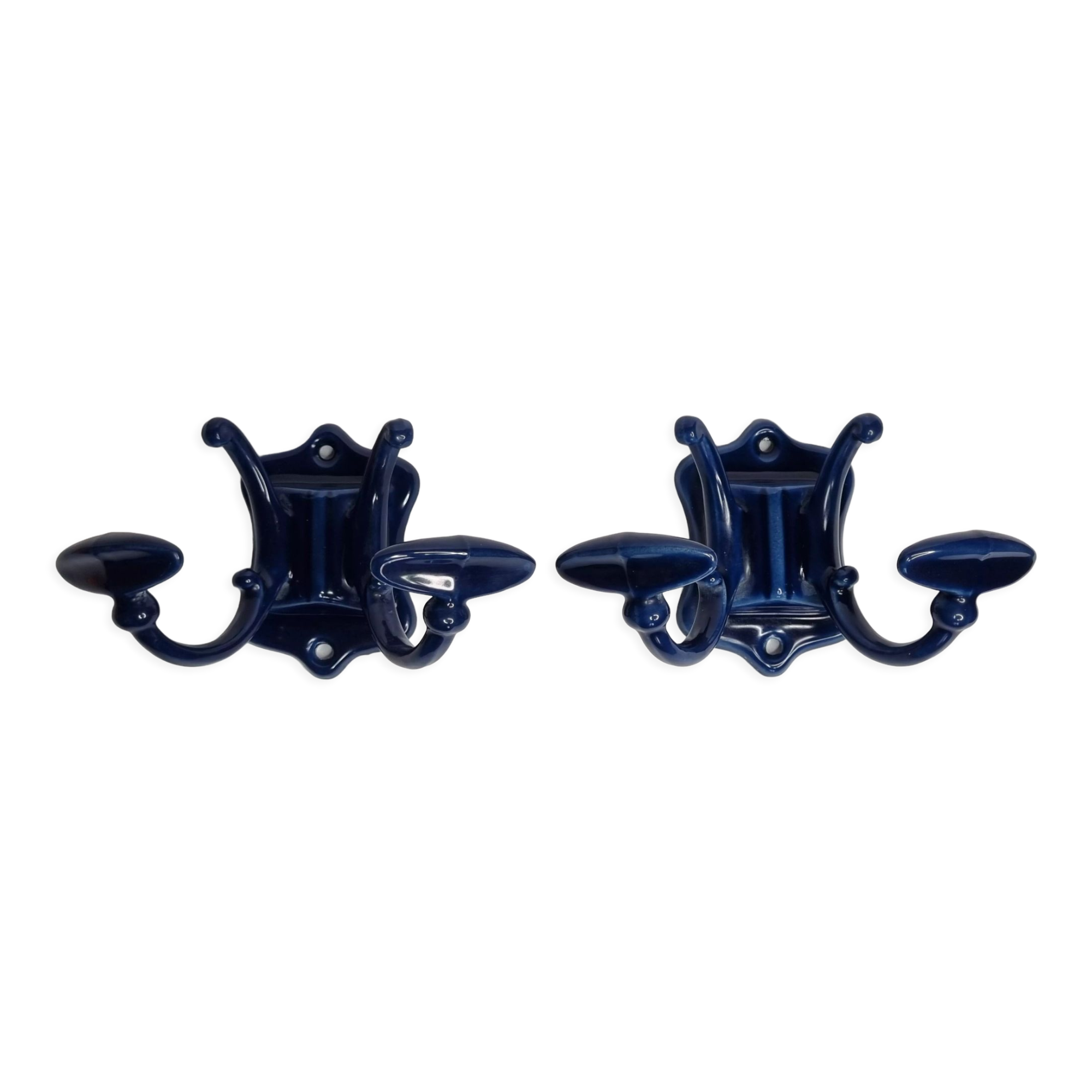 Pair of 1910 art nouveau period coat hooks in blue enameled cast iron