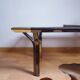 Vintage golden 70s coffee table and space age smoked glass