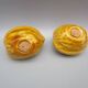 Pair of old earthenware salt/pepper shakers in “walnut” shape