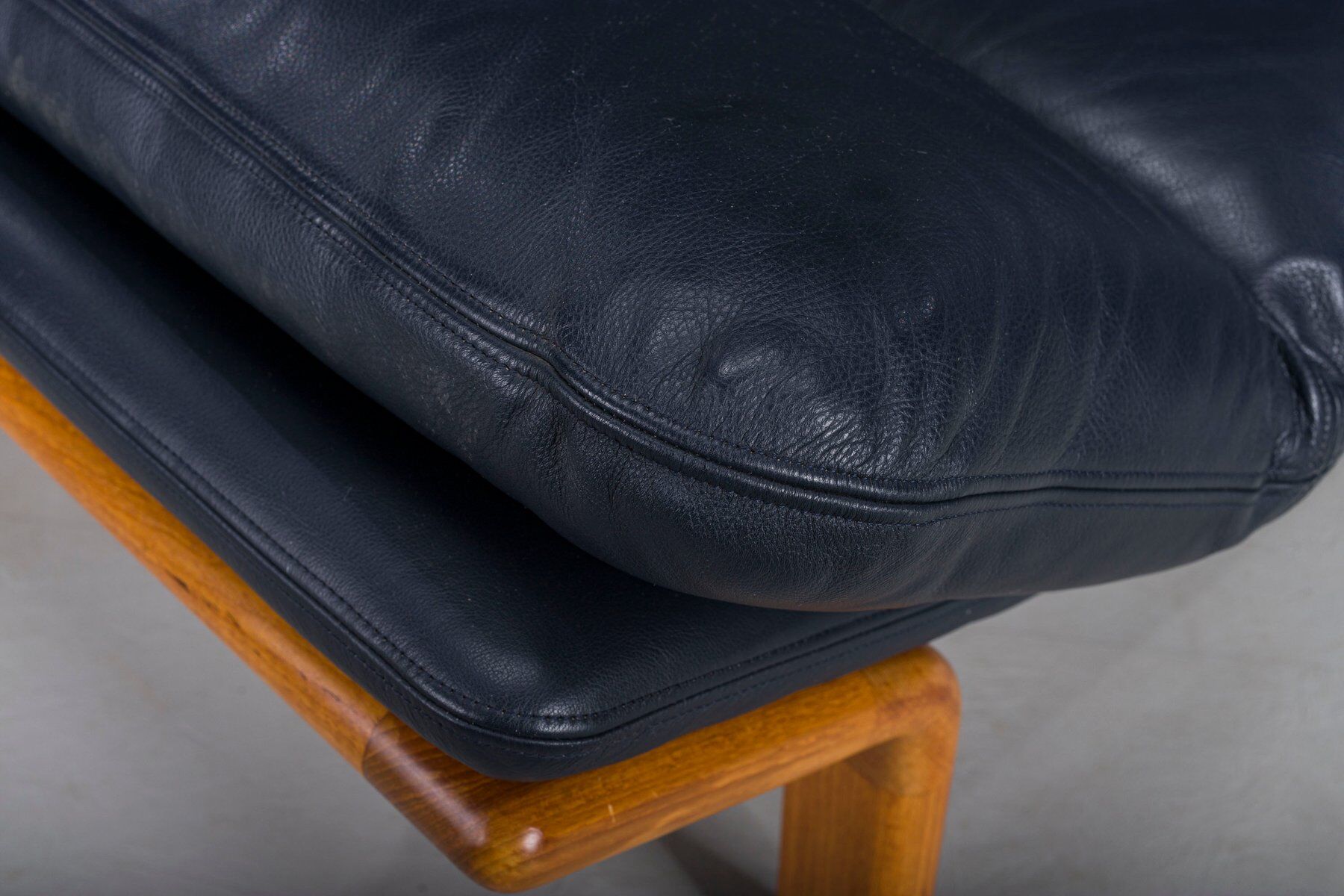 Danish teak and navy blue leather 3-seater sofa from Komfort, 1970s
