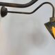 Pair of XL patinated brass wall lights, France, 1970.