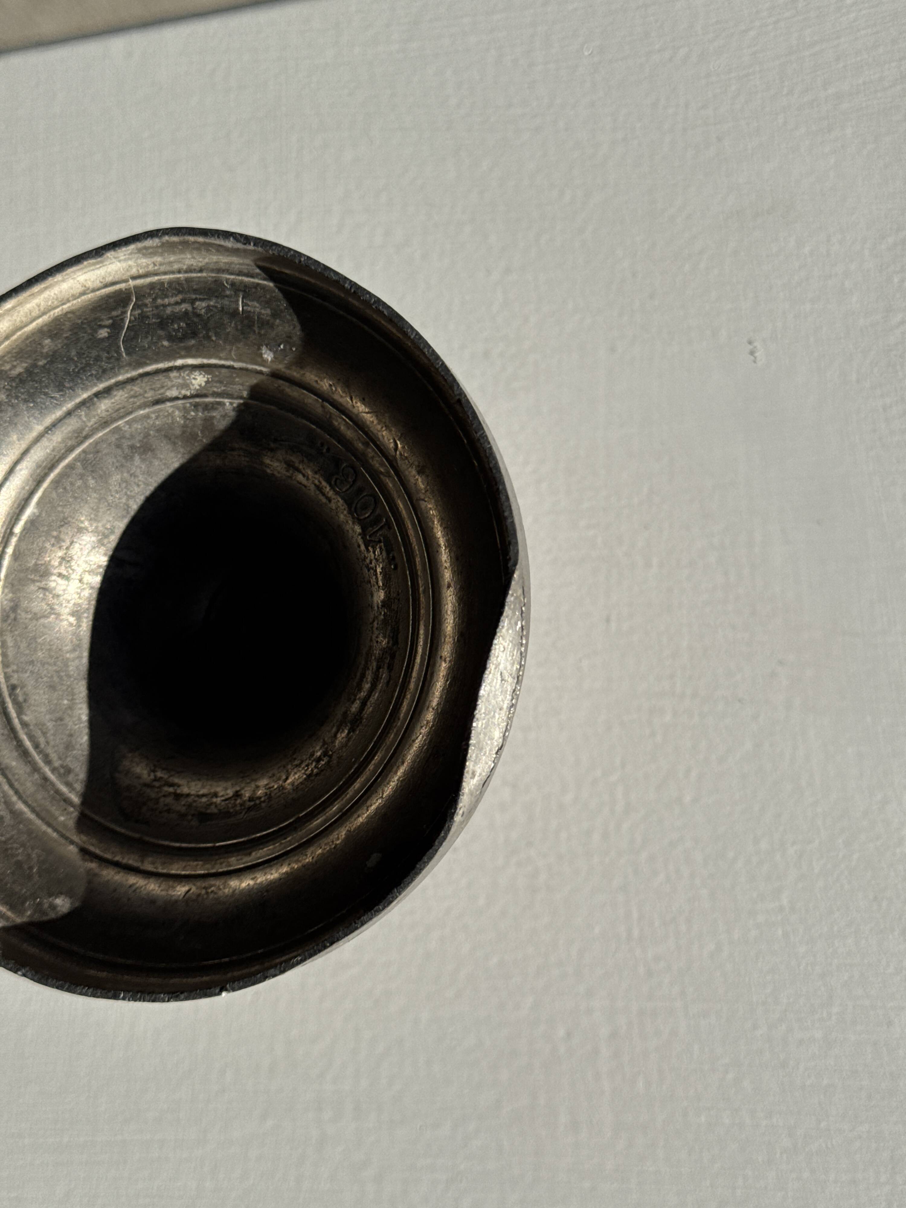 Small antique candle holder engraved in silver-plated metal, in its original condition.