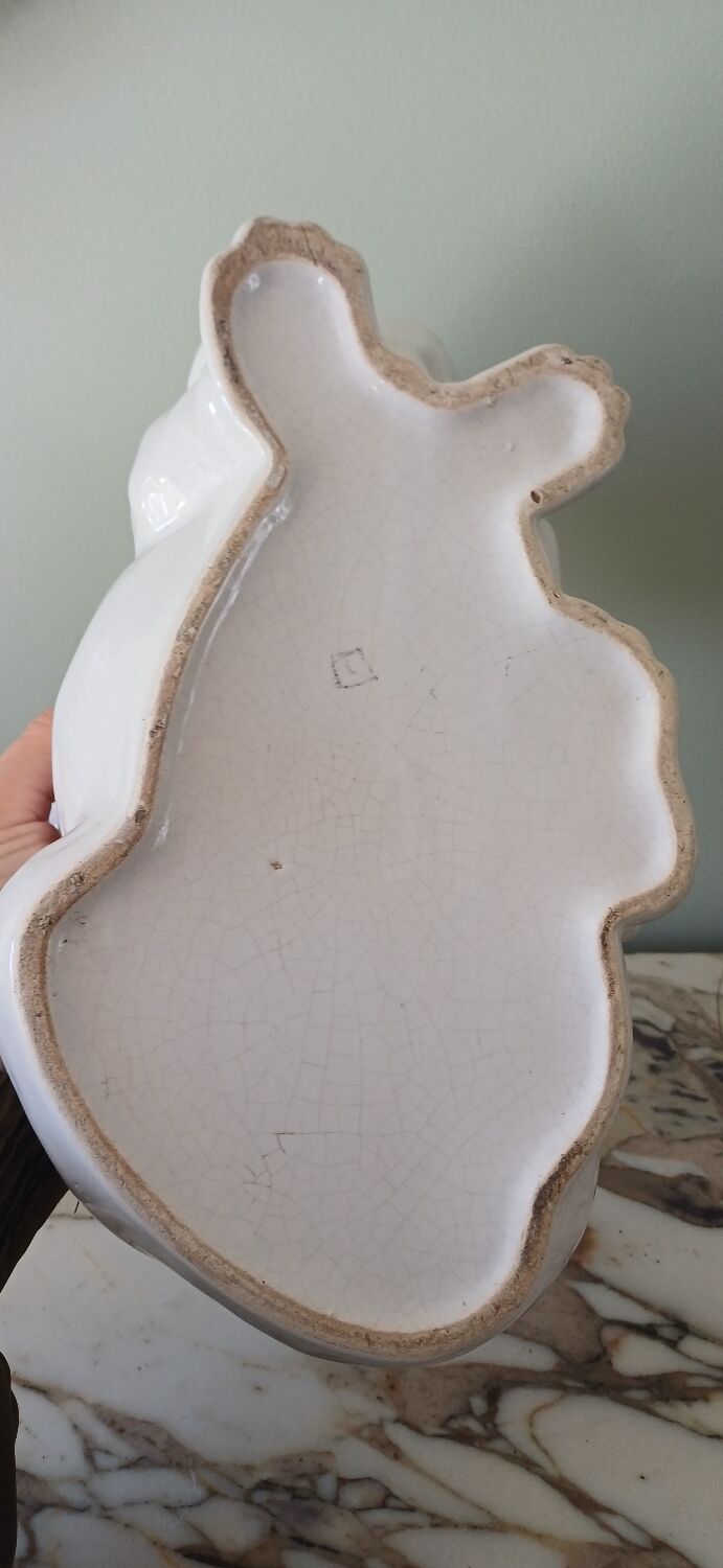 Cracked glazed faience in a zoomorphic design