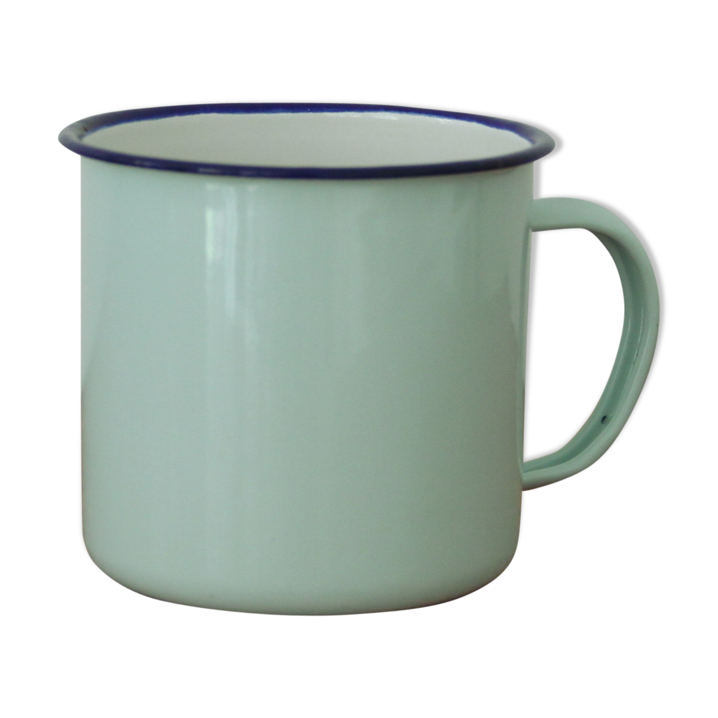 Green enamelled mug of water