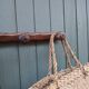 Small antique wooden wall coat rack.