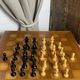 Chess set with wooden board and pieces