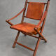 Vintage Safari Armchair in Cognac Leather and Turned Wood – 1940s/50s