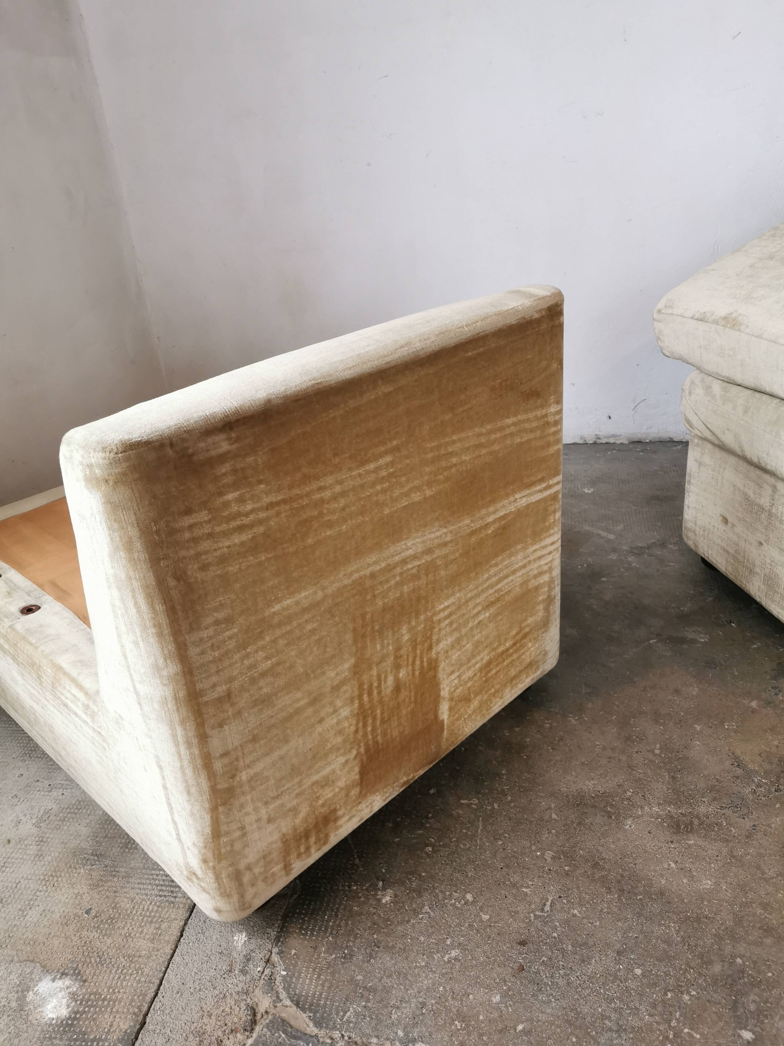 Pair of modular velvet armchairs and ottoman