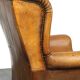 Sheepskin wingback chair with a unique design and a beautiful patina