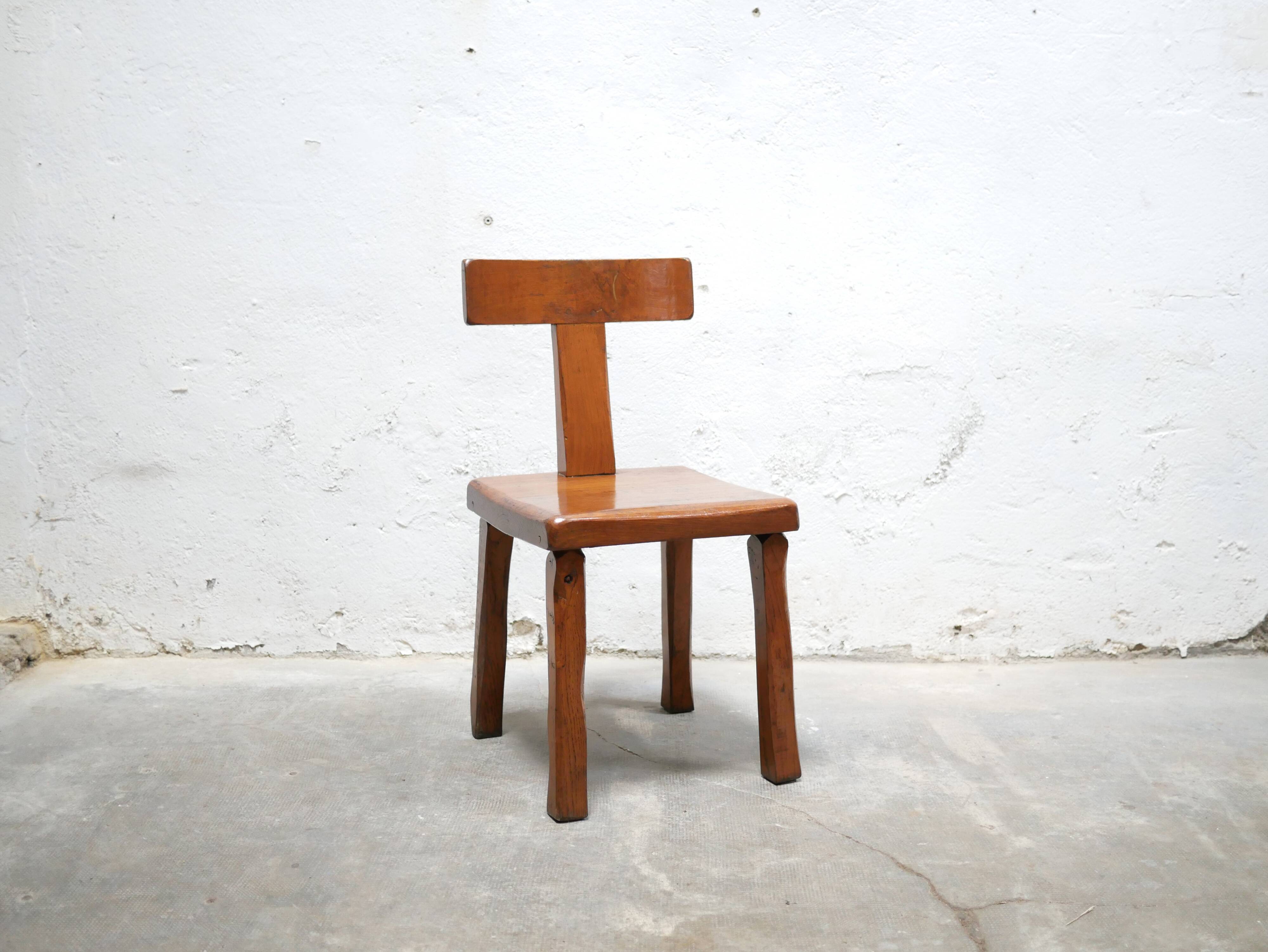 Vintage brutalist wooden T chair