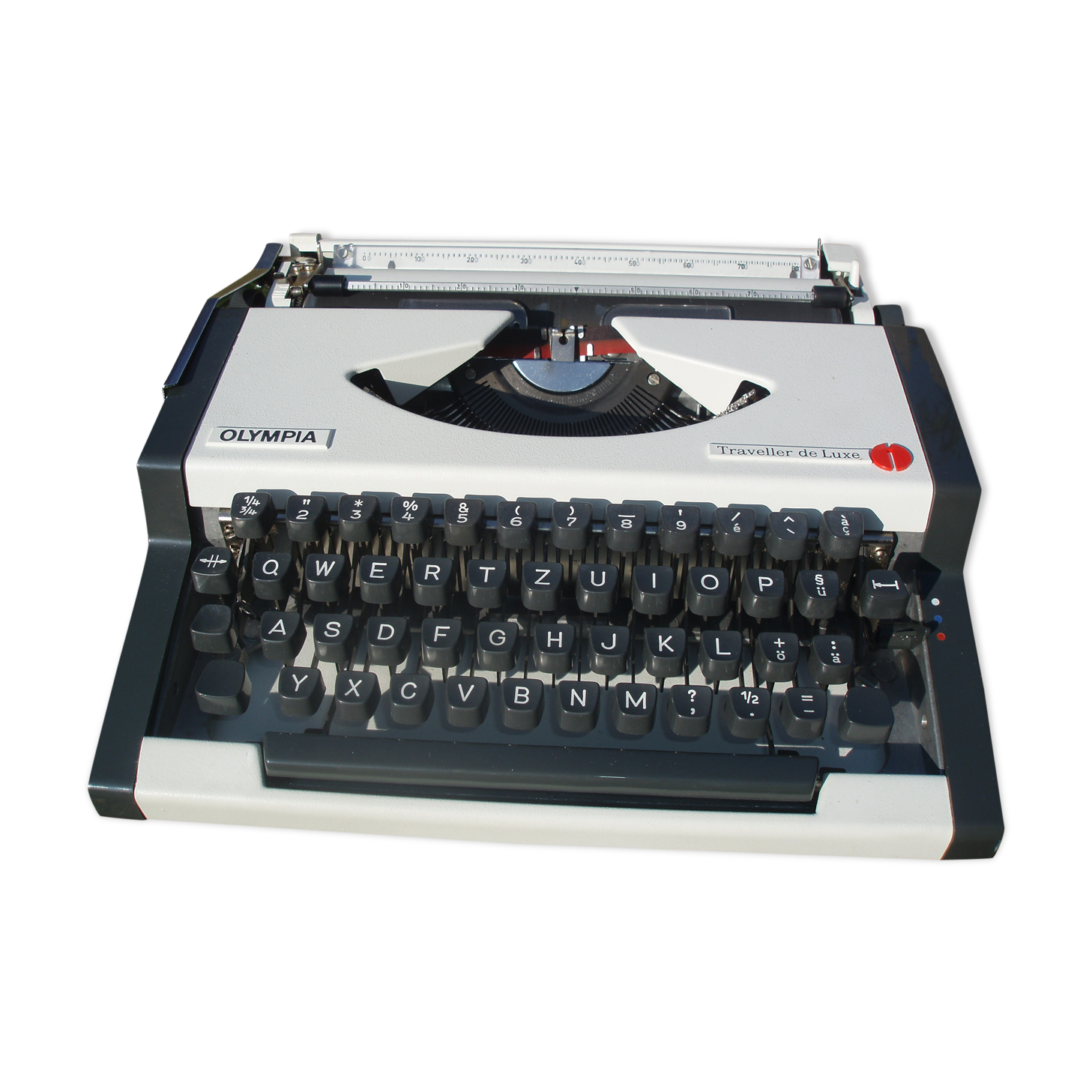 Revised typewriter and Olympia Traveller luxury with his satchel