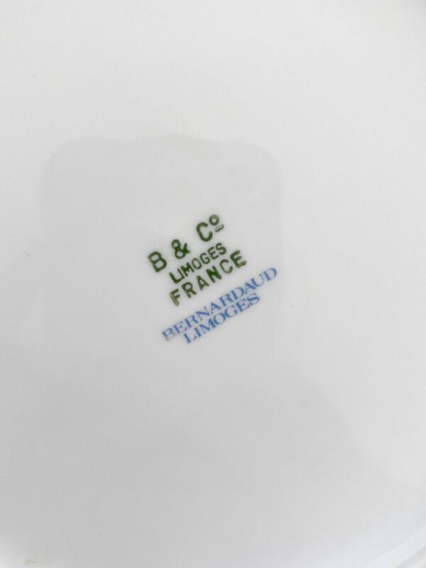 4 assiettes à dessert en porcelaine décor de fleurs Bernardaud Limoges