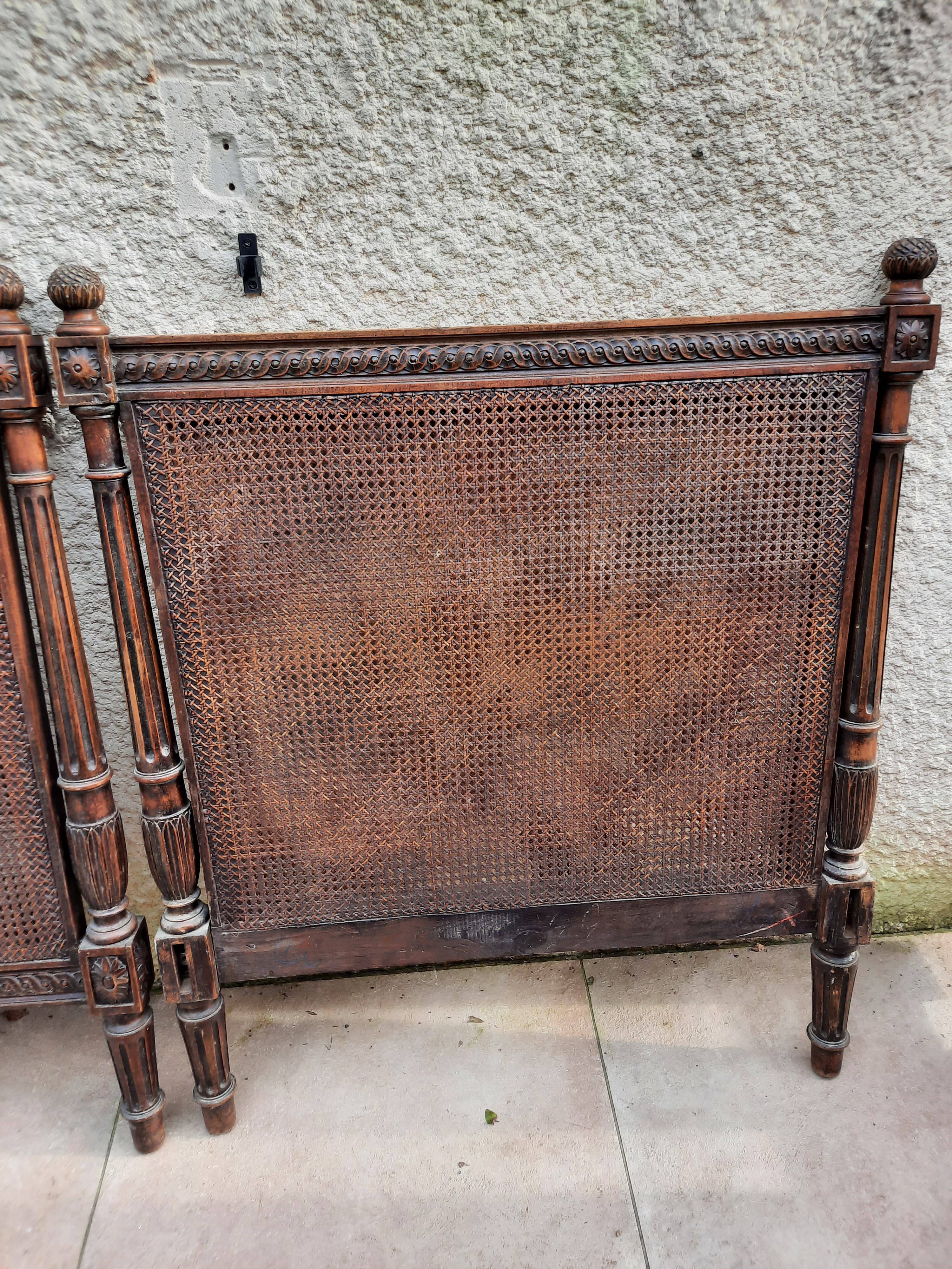 Hand-carved Louis XVI style headboards with chic vintage caning (1800s)