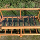 Table basse vintage en rotin et verre