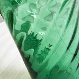 Green blown glass pitcher, unique twisted design