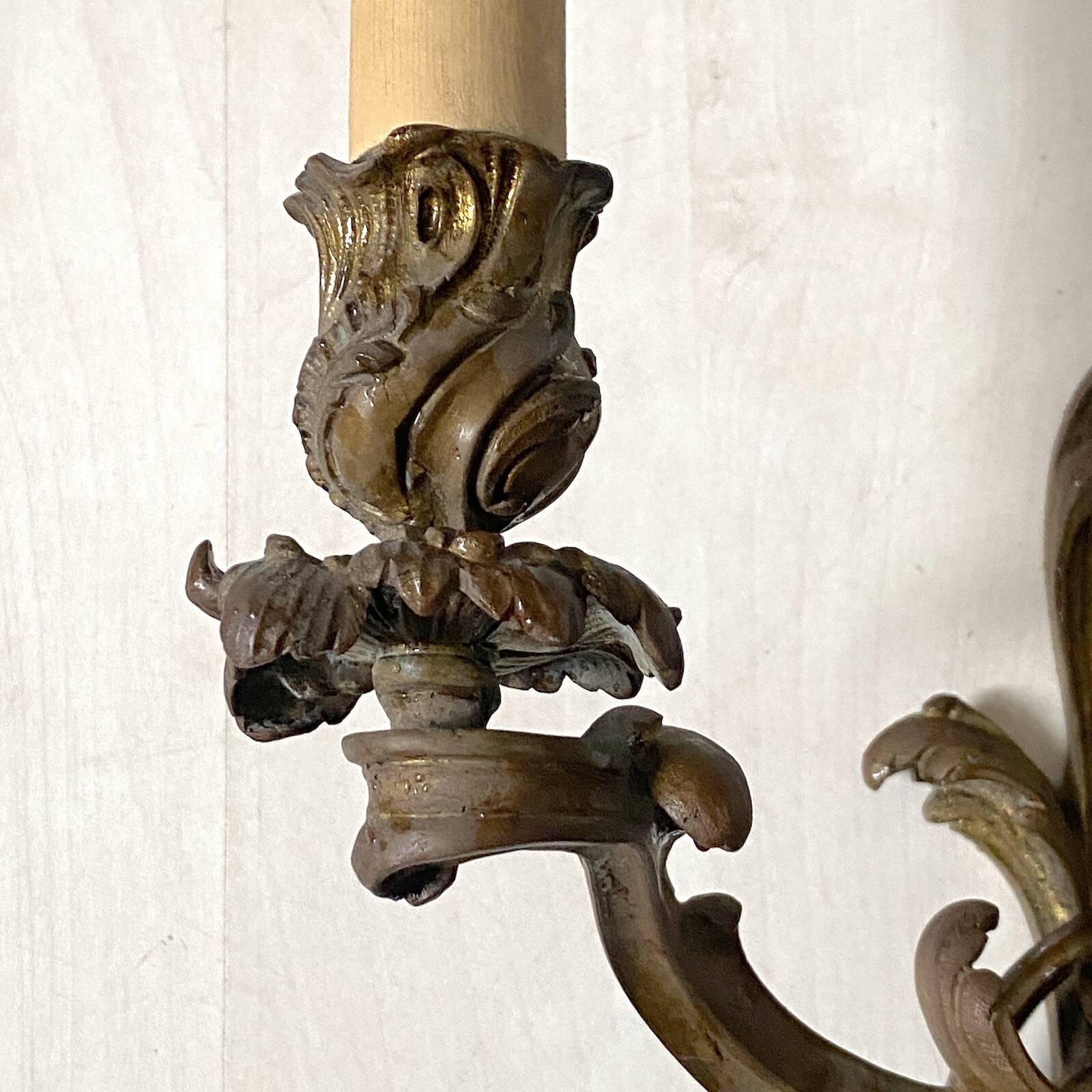 Pair of bronze wall sconces in Louis XV style