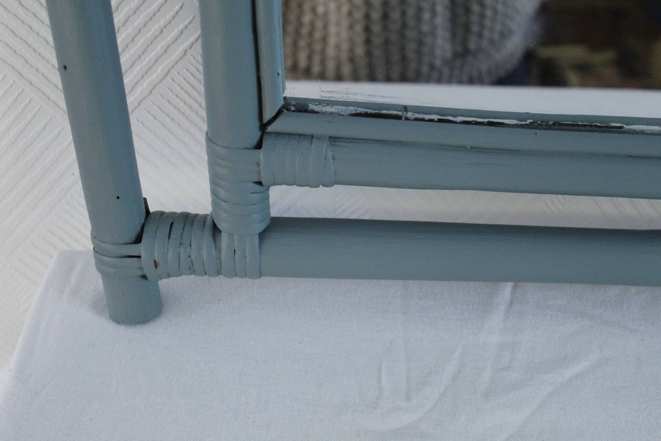 Sage green painted rattan mirror