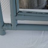 Sage green painted rattan mirror