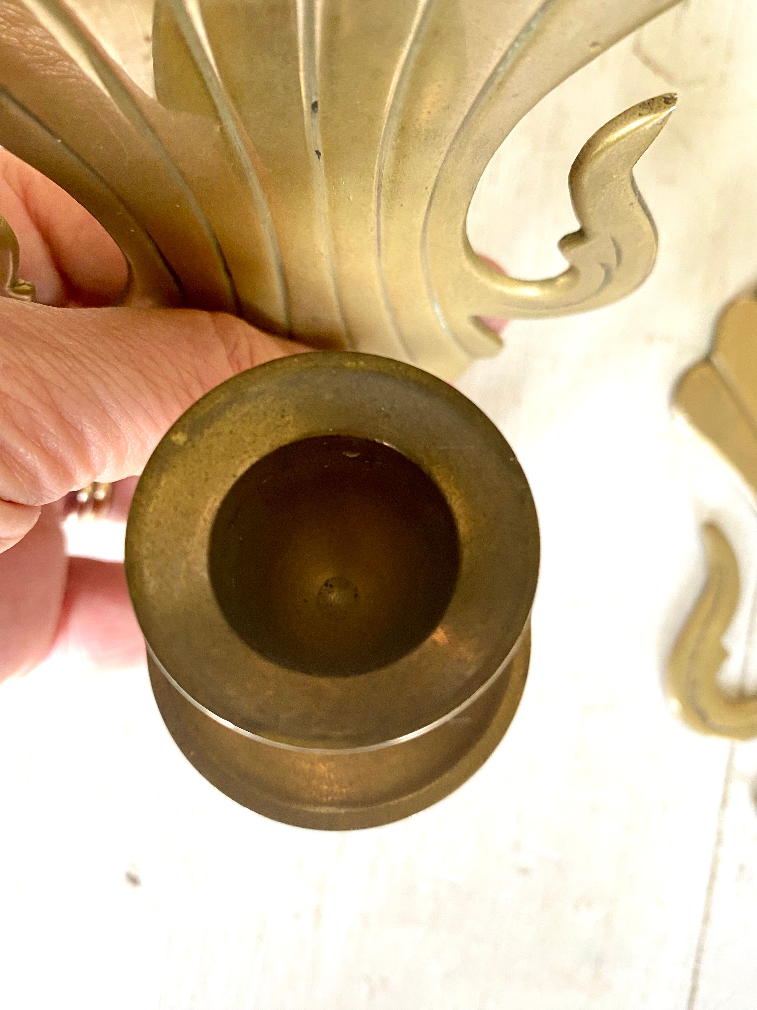 Pair of brass wall candle holders