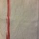 Former flax torchon cushion red stripes monogram b