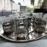 6 small glasses in their silver metal holder, with handle