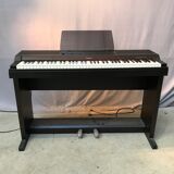 Roland HP 700 keyboard and its stand with pedal